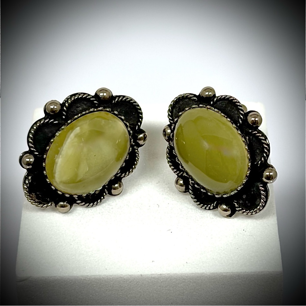 Vintage Estimated 1960’s oval Silver and Moon Glow Lucite Clip On Earrings
